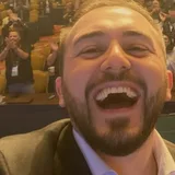 Chris Michael in front of a packed conference room